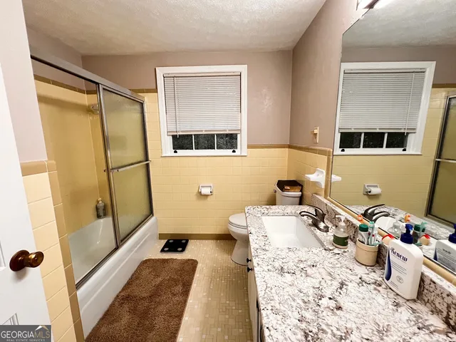 a room with furniture and a window