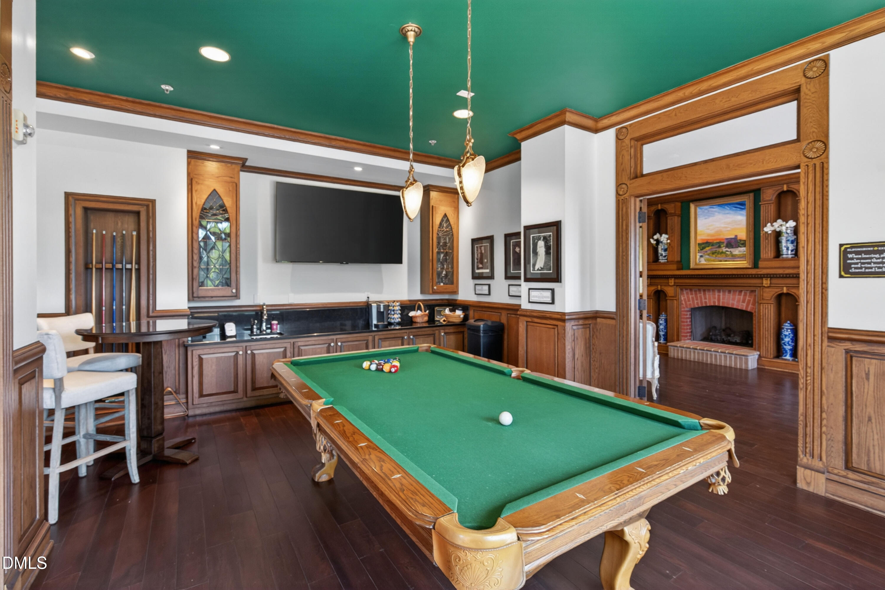710 Independence Place, Unit 104 Raleigh, NC 27603 - Photo 26 of 34 a room with pool table flat screen tv and windows