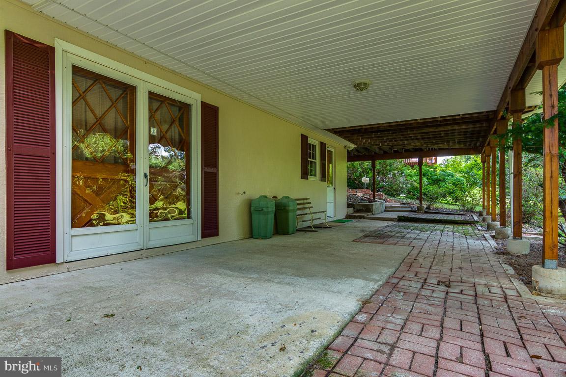 4617 Roundhill Road Ellicott City, MD 21043 - Photo 27 of 30 Walkout and covered basement porch space!