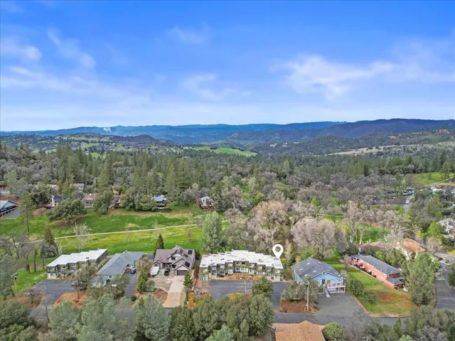 a view of lake with green space