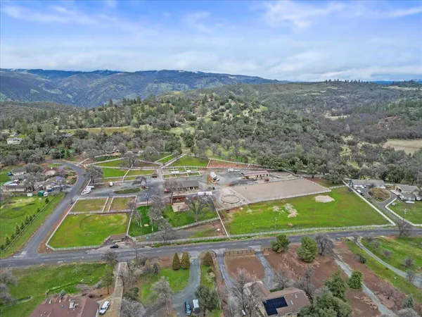 a view of a lake with houses in the back