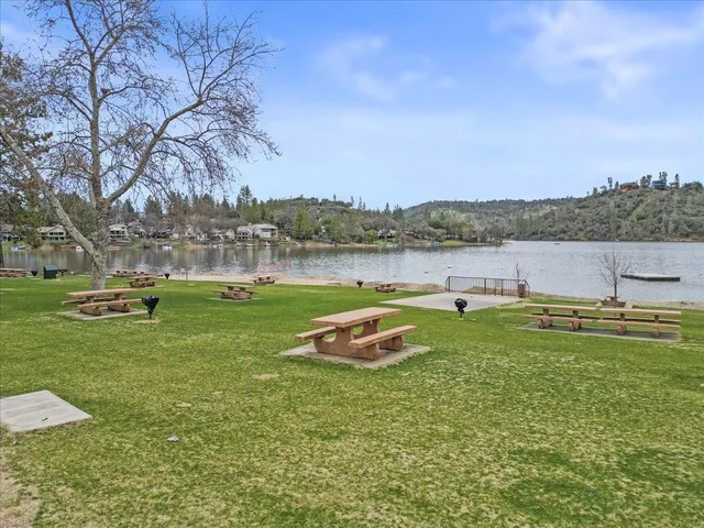 a view of a large building with a bench