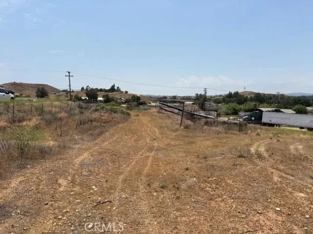 a view of a town with mountains in the background