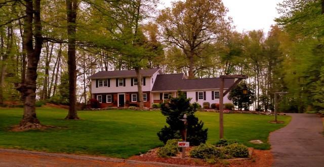 7 Christmas Tree Hill Road Shelton, CT 06484 - Photo 1 of 1 a front view of a house with a garden