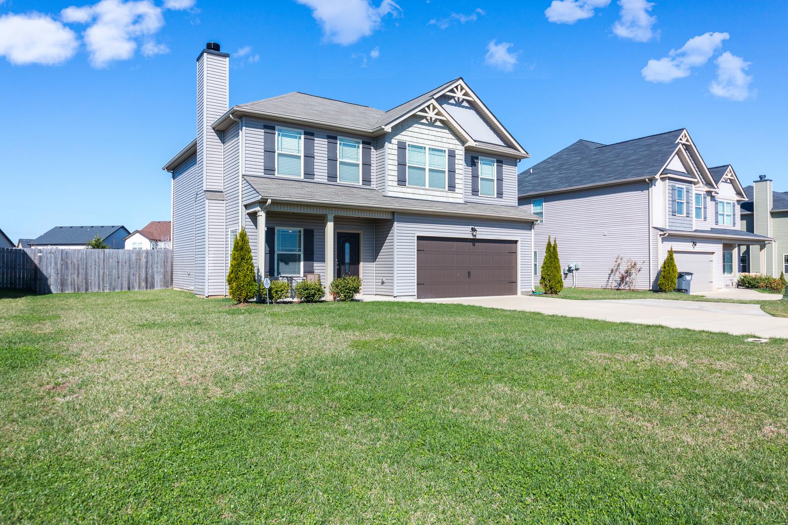 2340 Pea Ridge Road Clarksville, TN 37040 - Photo 1 of 25 a view of a house with a yard and a large tree