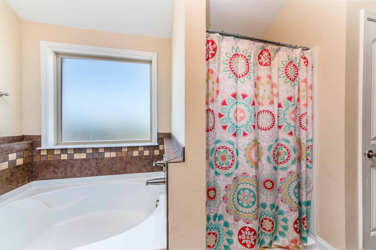 2340 Pea Ridge Road Clarksville, TN 37040 - Photo 21 of 25 a bathroom with a bathtub and a sink