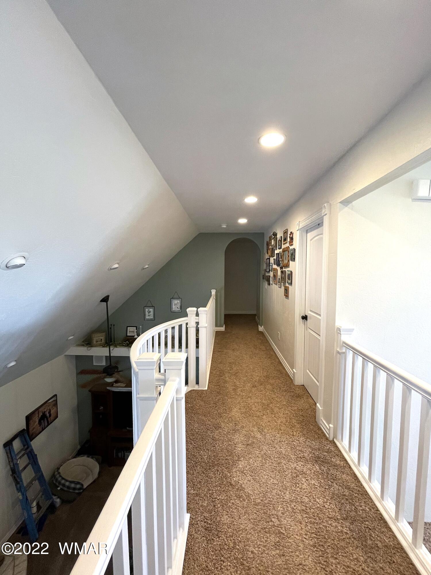 1713 Snowline Road Eagar, AZ 85925 - Photo 34 of 53 a view of a hallway with stairs