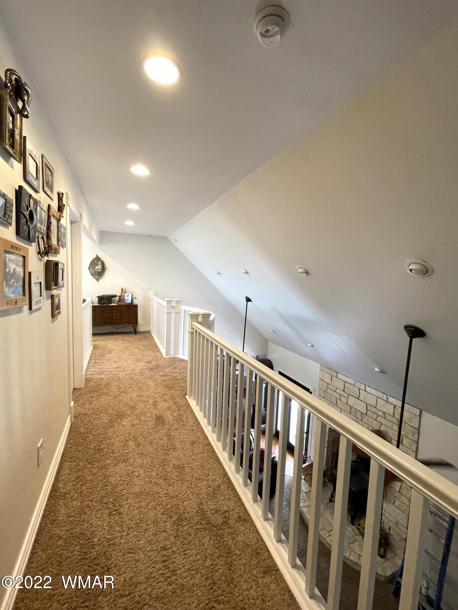 1713 Snowline Road Eagar, AZ 85925 - Photo 35 of 53 a view of a hallway with stairs