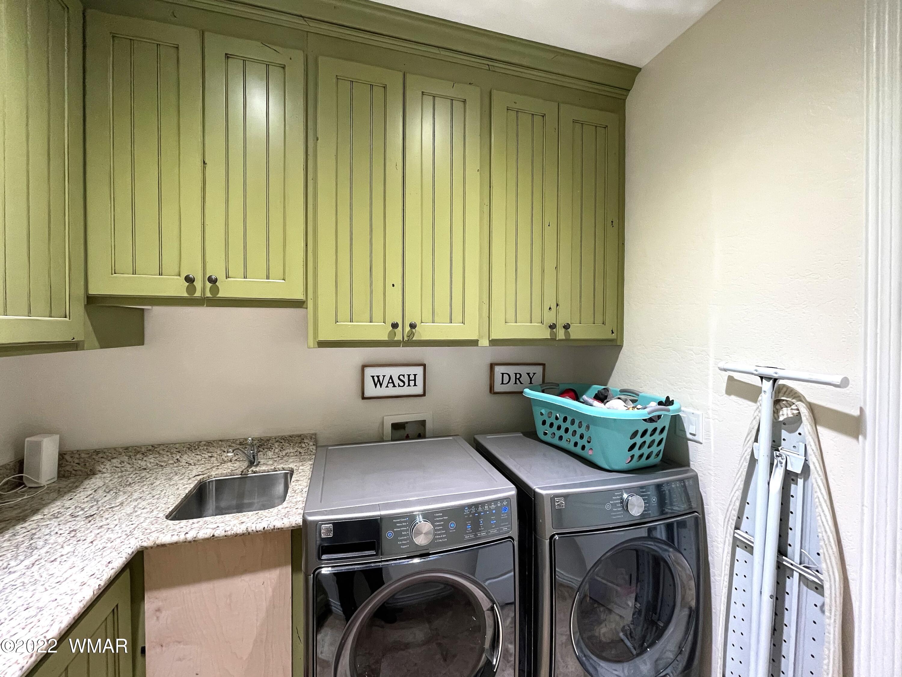 1713 Snowline Road Eagar, AZ 85925 - Photo 47 of 53 a utility room with dryer and washer