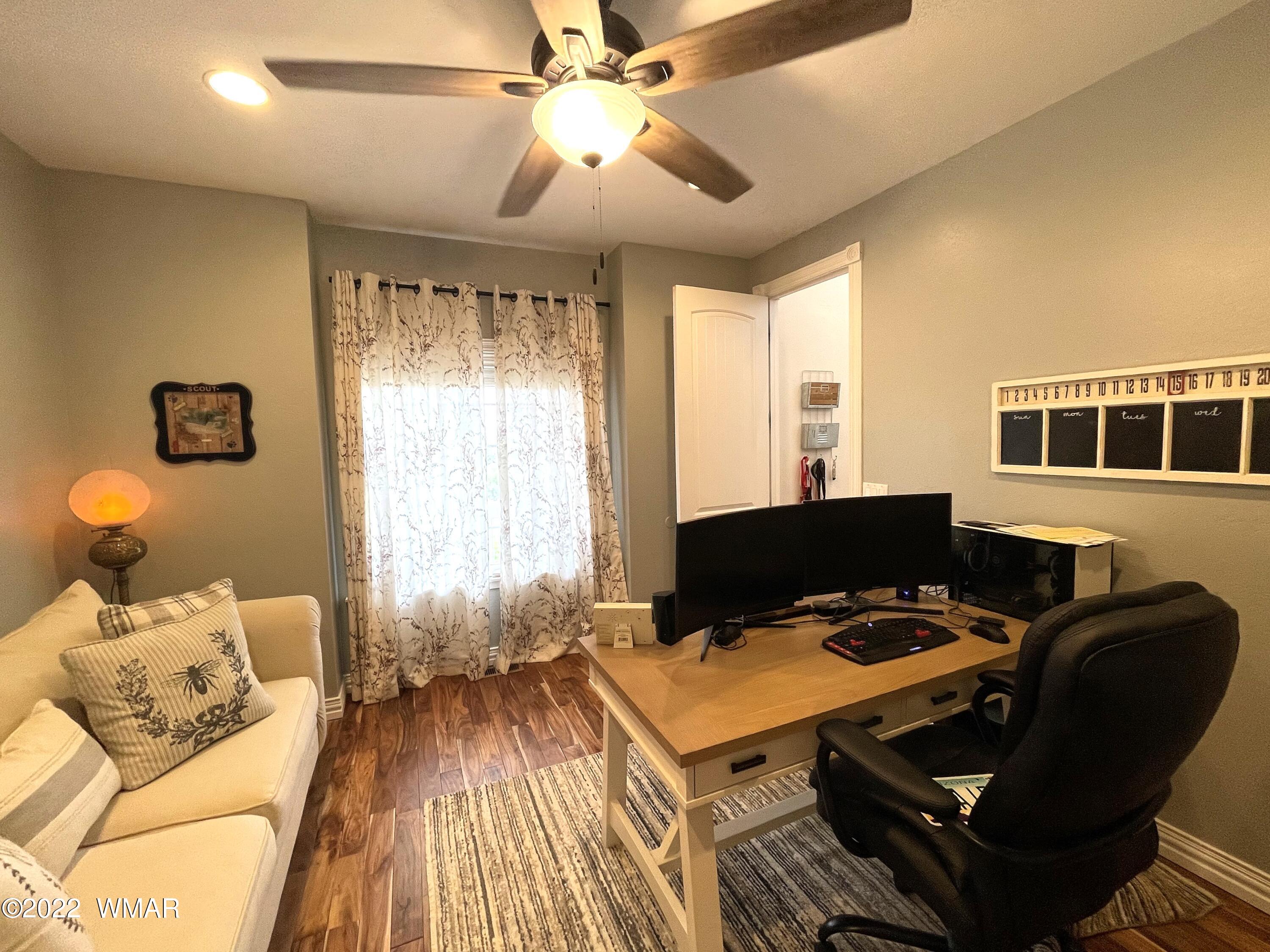1713 Snowline Road Eagar, AZ 85925 - Photo 9 of 53 a workspace with furniture and a window