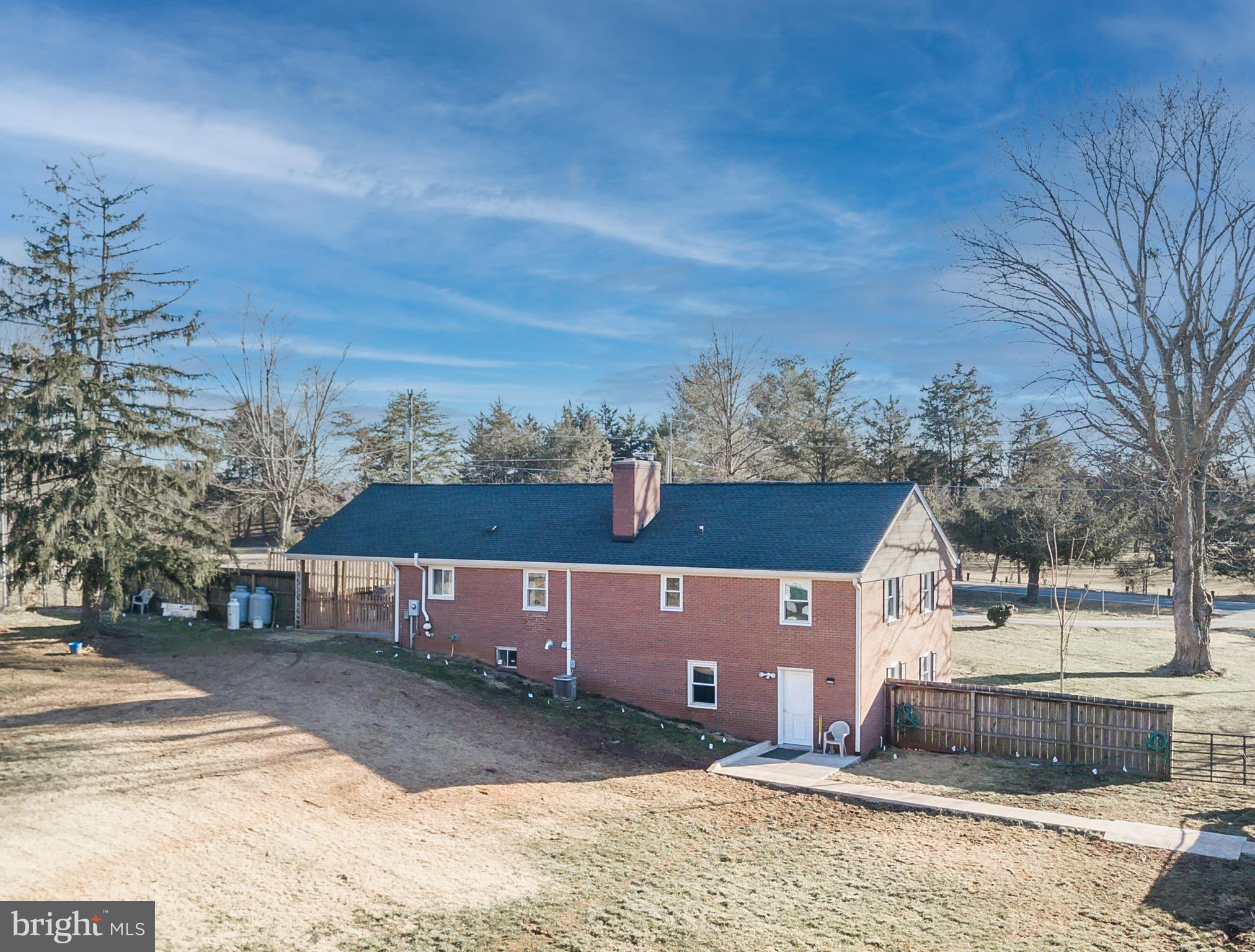 4720 Dumfries Road Catlett, VA 20119 - Photo 3 of 51 Exterior - Rear Yard Photo with Sidewalk