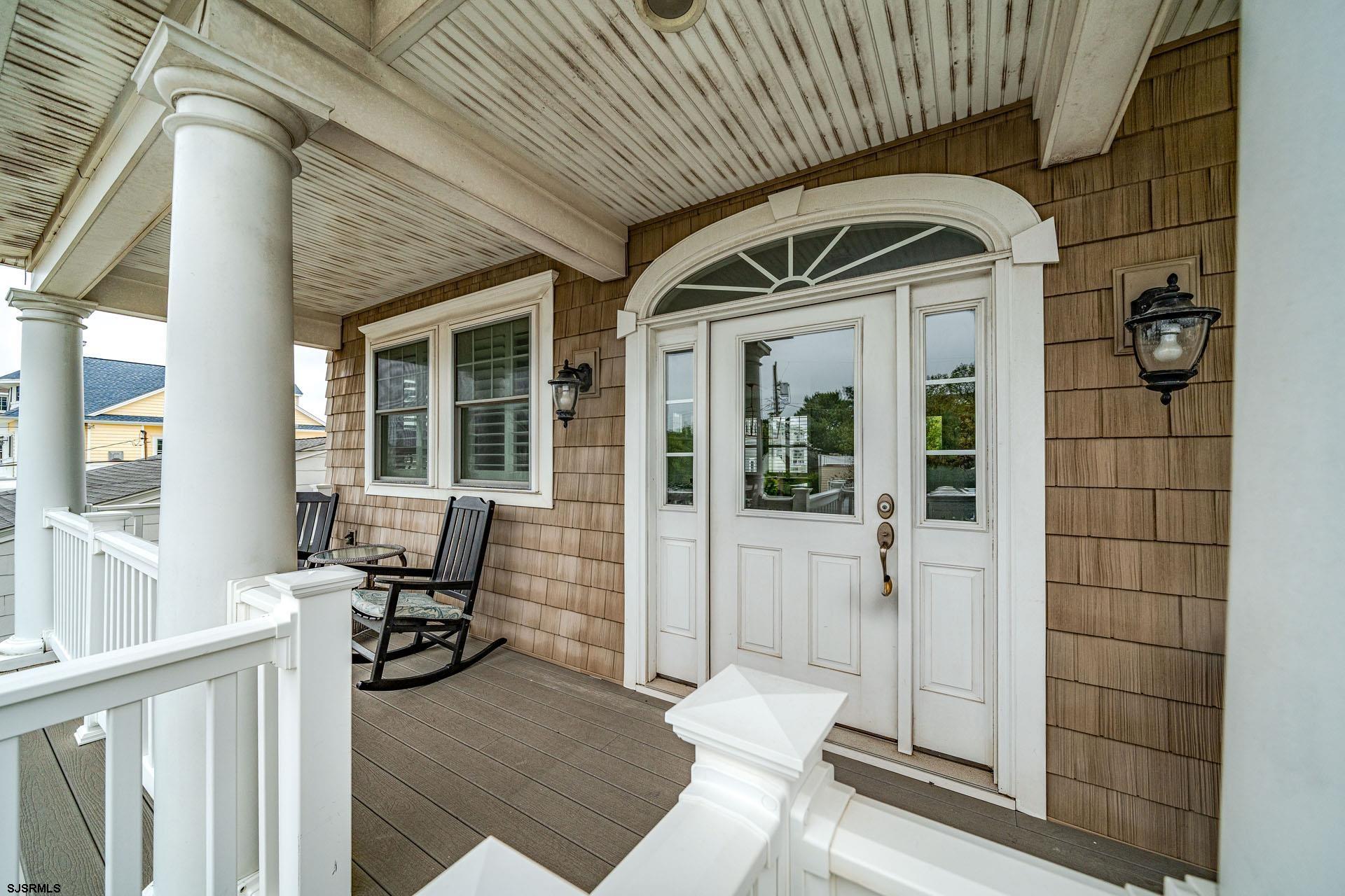84 East Station Road Ocean City, NJ 08226 - Photo 2 of 30 a front view of a house with outdoor seating