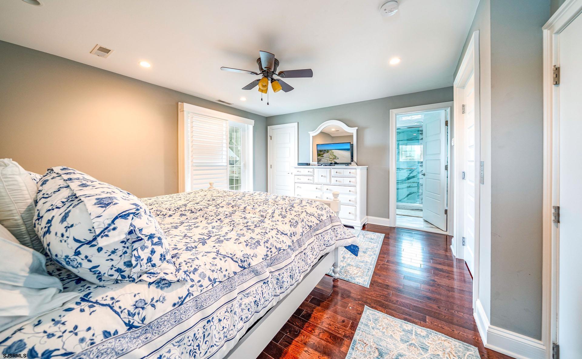 84 East Station Road Ocean City, NJ 08226 - Photo 24 of 30 a bedroom with a bed and a window