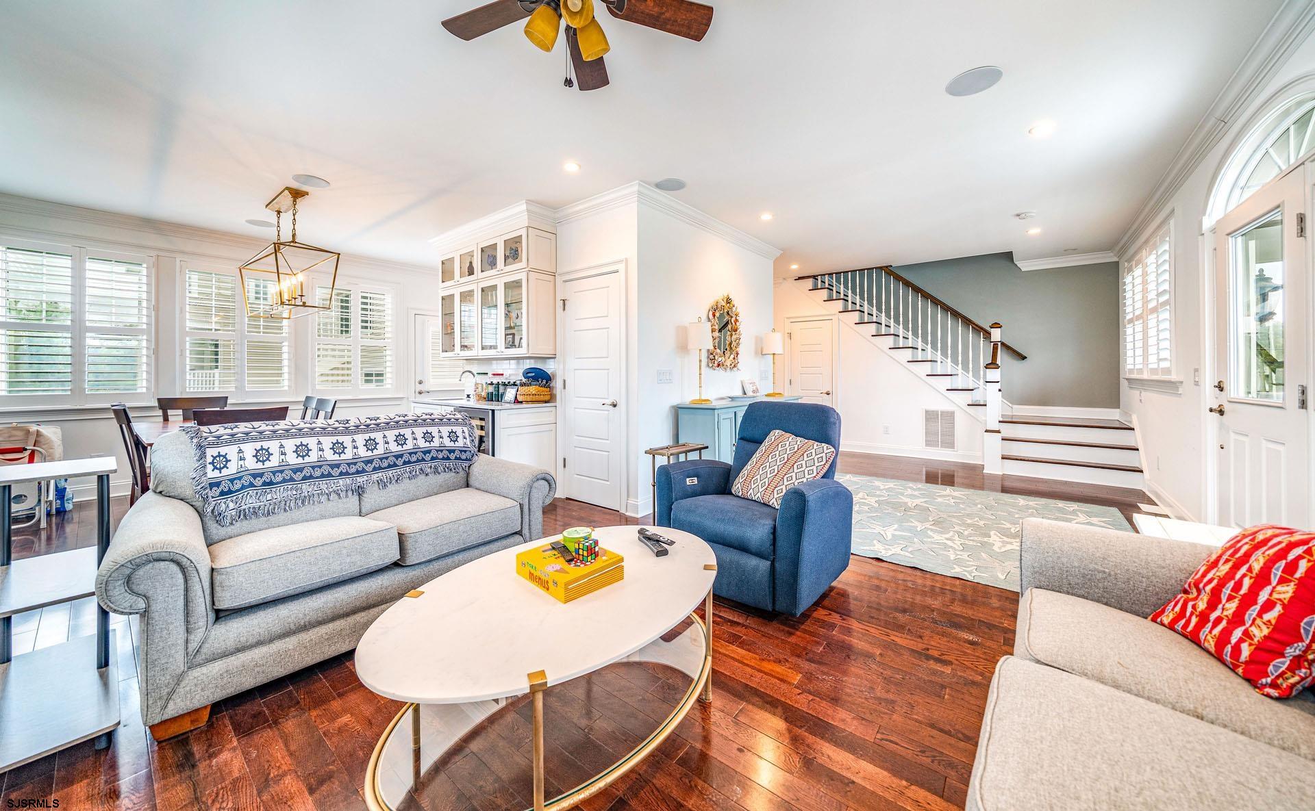 84 East Station Road Ocean City, NJ 08226 - Photo 4 of 30 a living room with furniture and a chandelier