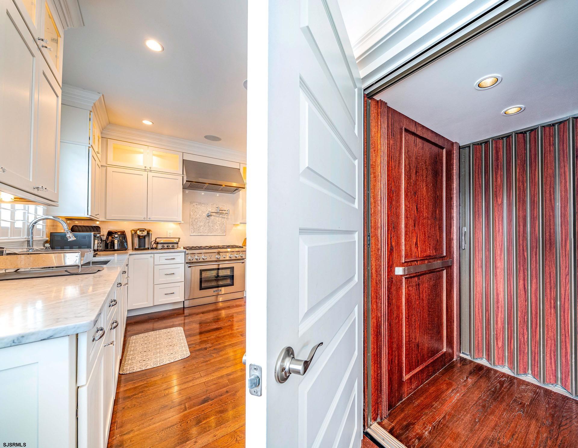 84 East Station Road Ocean City, NJ 08226 - Photo 9 of 30 a kitchen with stainless steel appliances granite countertop a refrigerator and a sink