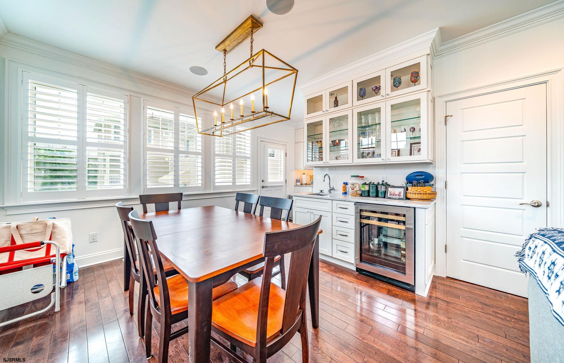 84 East Station Road Ocean City, NJ 08226 - Photo 10 of 30 a dining table with chairs and wooden floor