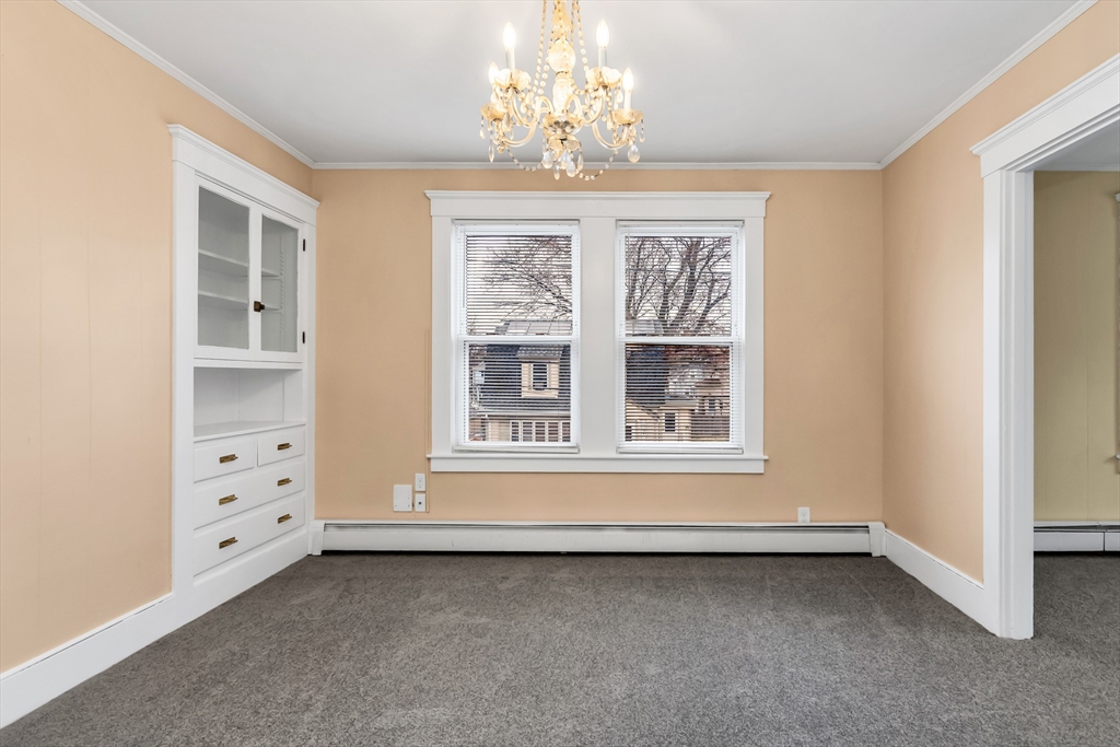 32-34 Magnolia Street, Unit 2 Lawrence, MA 01841 - Photo 18 of 29 a view of an empty room with a window