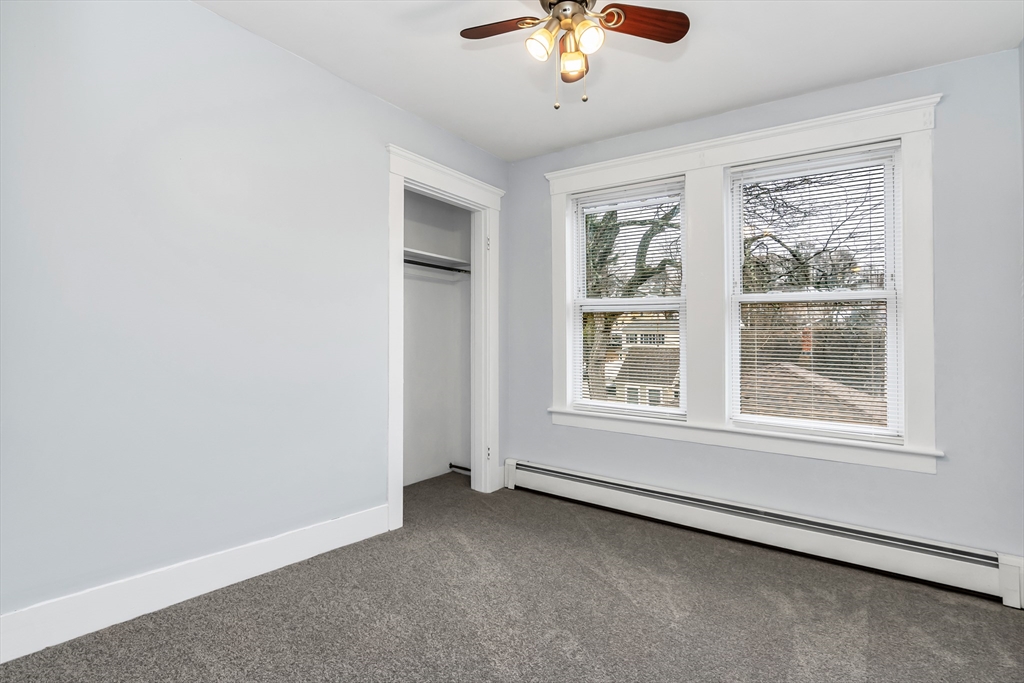 32-34 Magnolia Street, Unit 2 Lawrence, MA 01841 - Photo 24 of 29 an empty room with a window