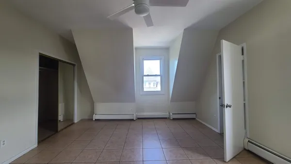 an empty room with windows