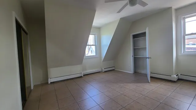 an empty room with windows