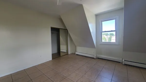 an empty room with windows