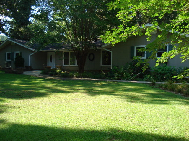 7573 Heritage Road Spring Hope, NC 27882 - Photo 6 of 21 Nice front lawn with mature landscaping.
