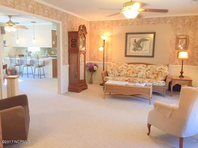 7573 Heritage Road Spring Hope, NC 27882 - Photo 7 of 21 Formal living room open to kitchen/den area.