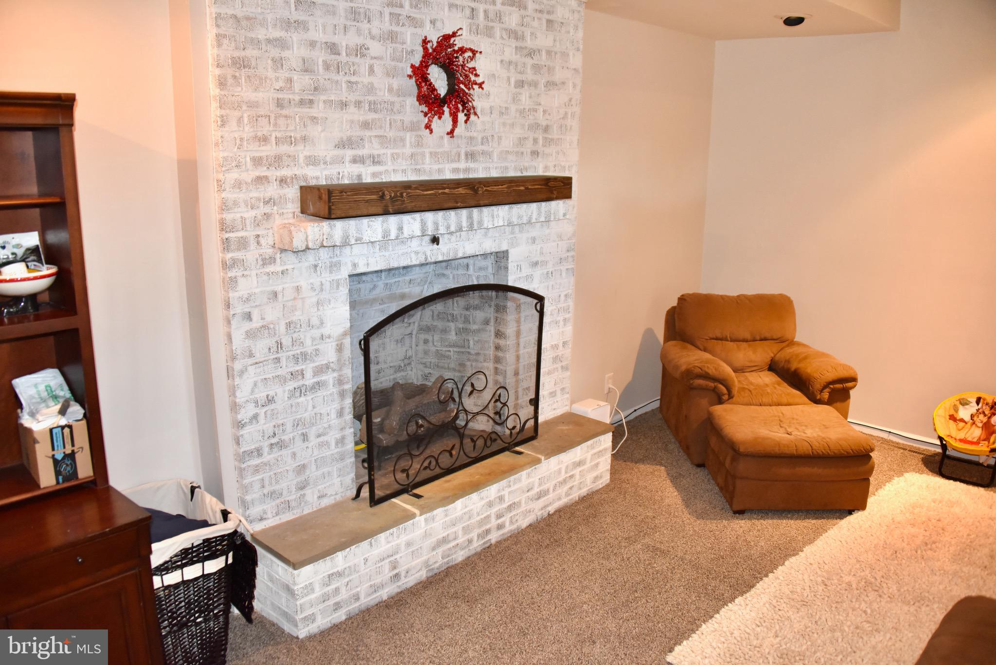 37 Tee Circle Reading, PA 19607 - Photo 31 of 35 Brick Gas Fireplace W/ Mantel