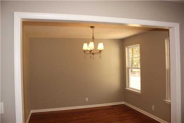 1331 Campbell Ridge Road Kingston Springs, TN 37082 - Photo 6 of 16 a view of a room with wooden floor chandelier and closet