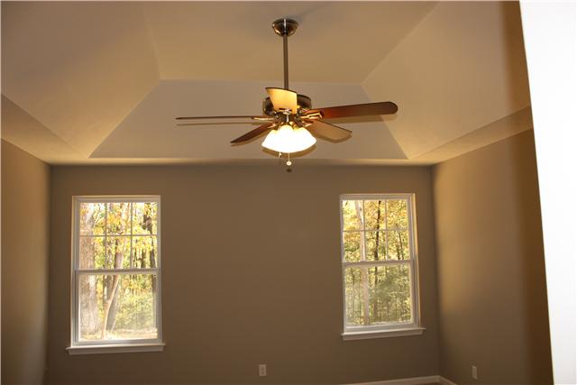 1331 Campbell Ridge Road Kingston Springs, TN 37082 - Photo 8 of 16 a view of a room with a window and chandelier