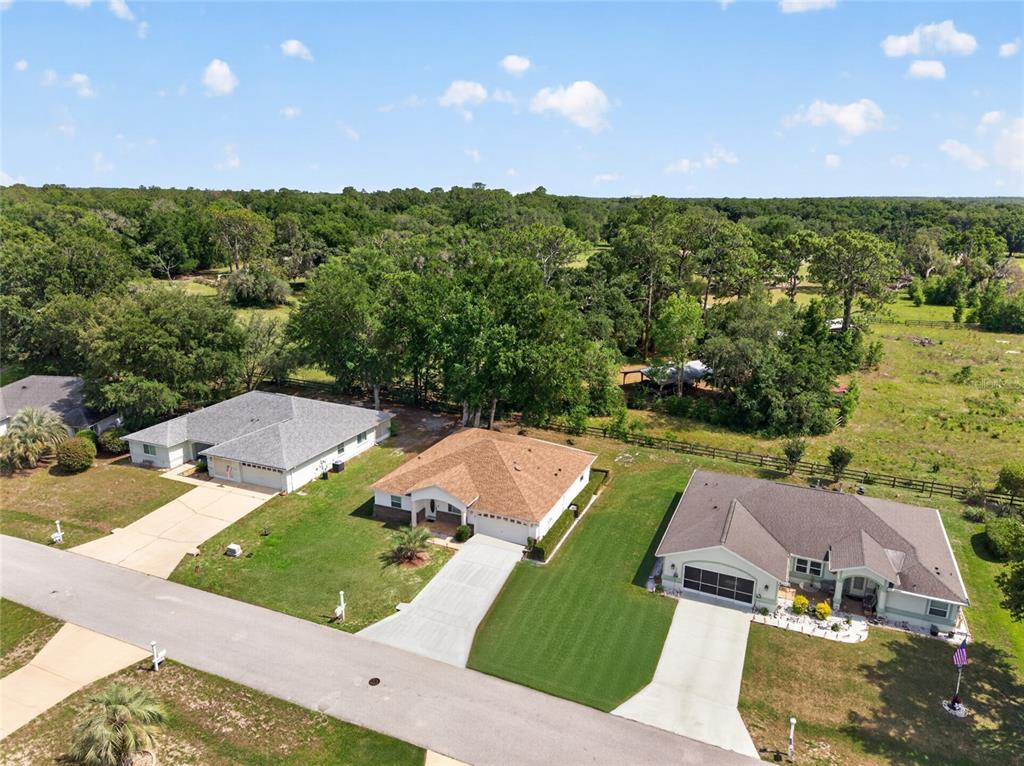 6032 Southwest 103rd Loop Ocala, FL 34476 - Photo 25 of 28 a view of a city from a terrace