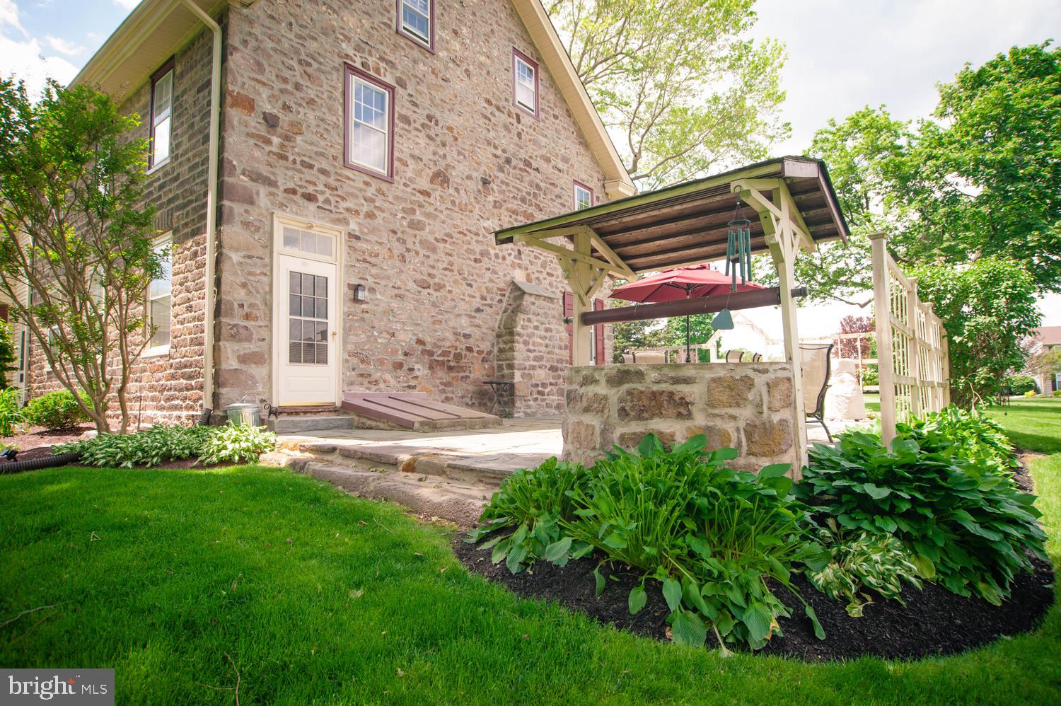 1145 Charter Road Warminster, PA 18974 - Photo 6 of 63 Side of home with wishing well