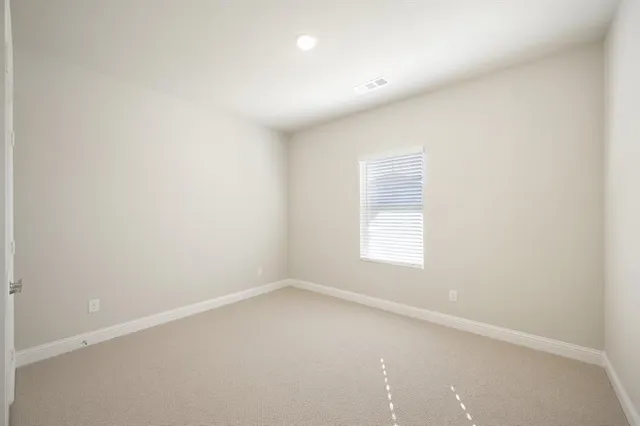 a kitchen with a sink cabinets and stainless steel appliances