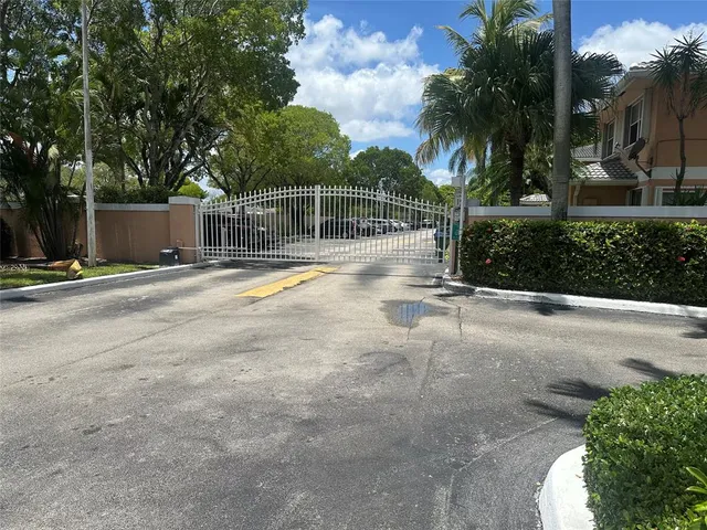 a view of a street with a house
