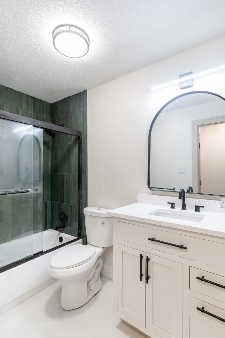 1339 North Dearborn Street, Unit 2B Chicago, IL 60610 - Photo 11 of 20 a bathroom with a toilet sink and shower