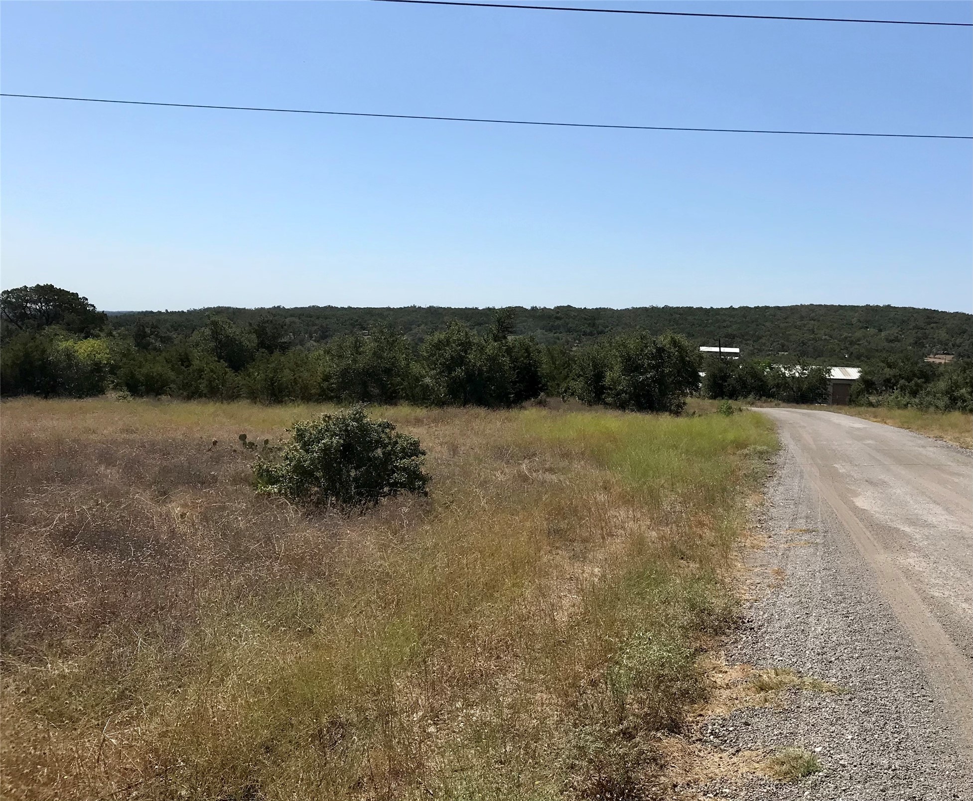 970 B Rr 32 San Marcos, TX 78666 - Photo 12 of 30 From the upper part of the property looking down the shared drive towards the entrance.
