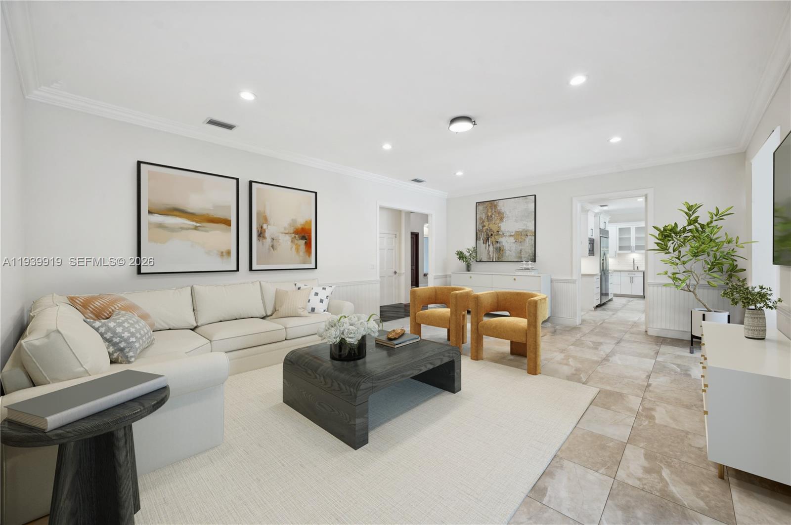 10001 Southwest 60th Court Pinecrest, FL 33156 - Photo 6 of 15 a living room with furniture and a painting