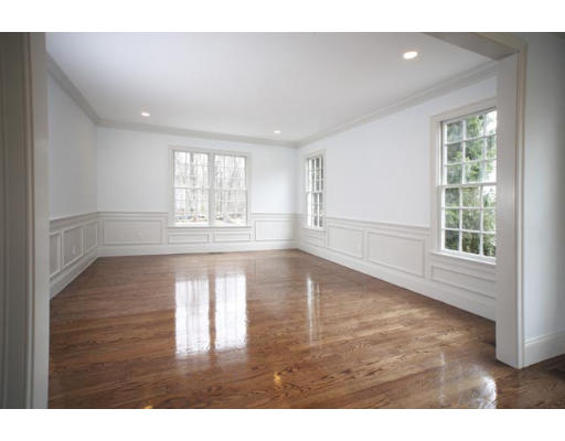 90 Wayne Road Newton, MA 02459 - Photo 3 of 6 a view of an empty room with wooden floor and a window