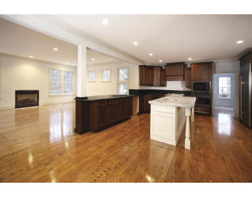 90 Wayne Road Newton, MA 02459 - Photo 4 of 6 a large kitchen with cabinets and wooden floor