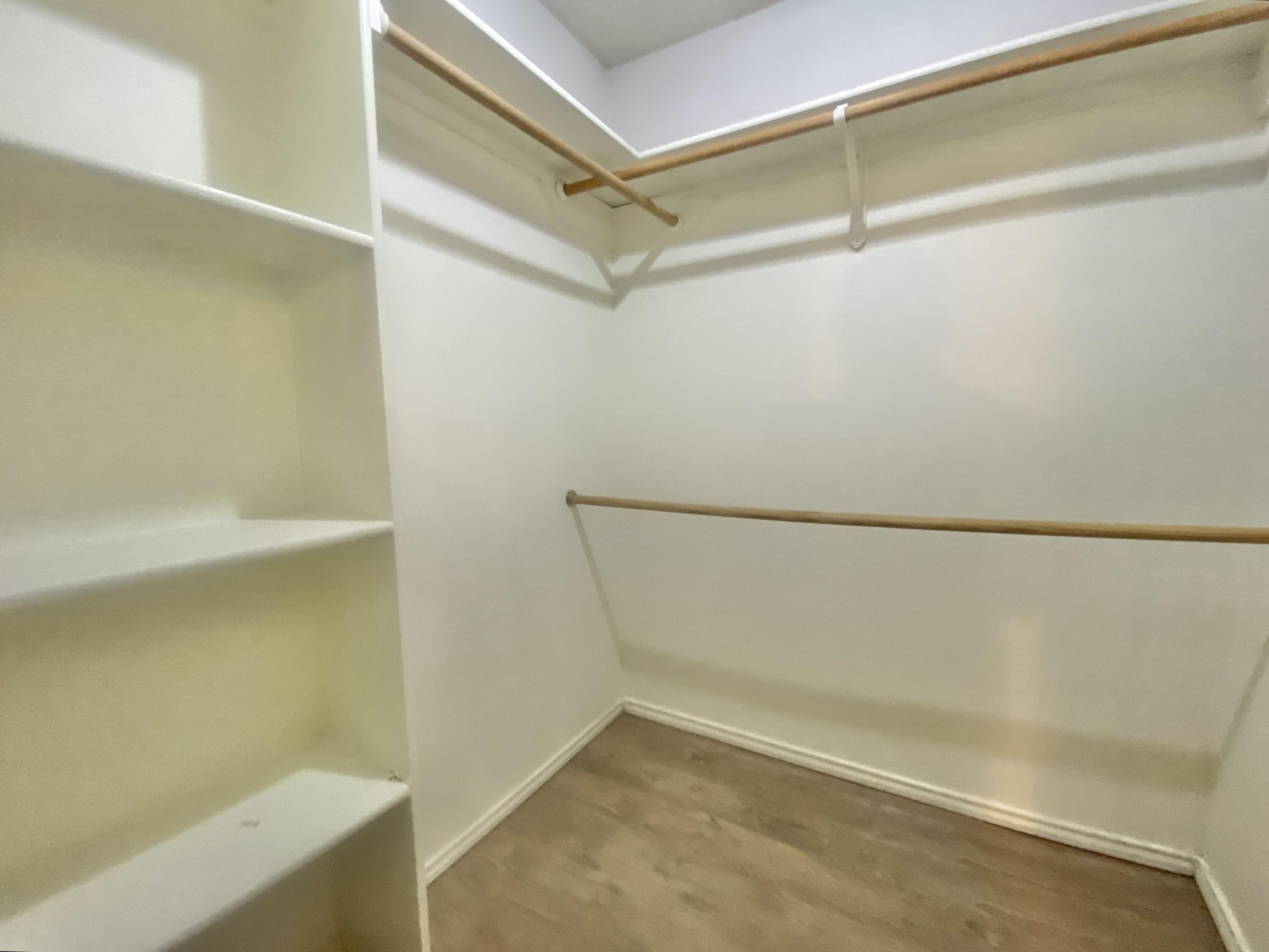 6320 7th Street Lubbock, TX 79416 - Photo 12 of 14 a view of an empty walk in closet