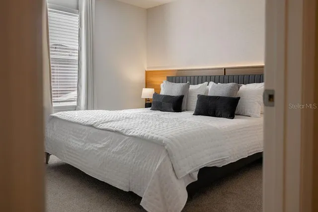 a view of swimming pool with outdoor seating