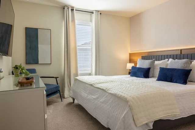 a view of a city with lawn chairs