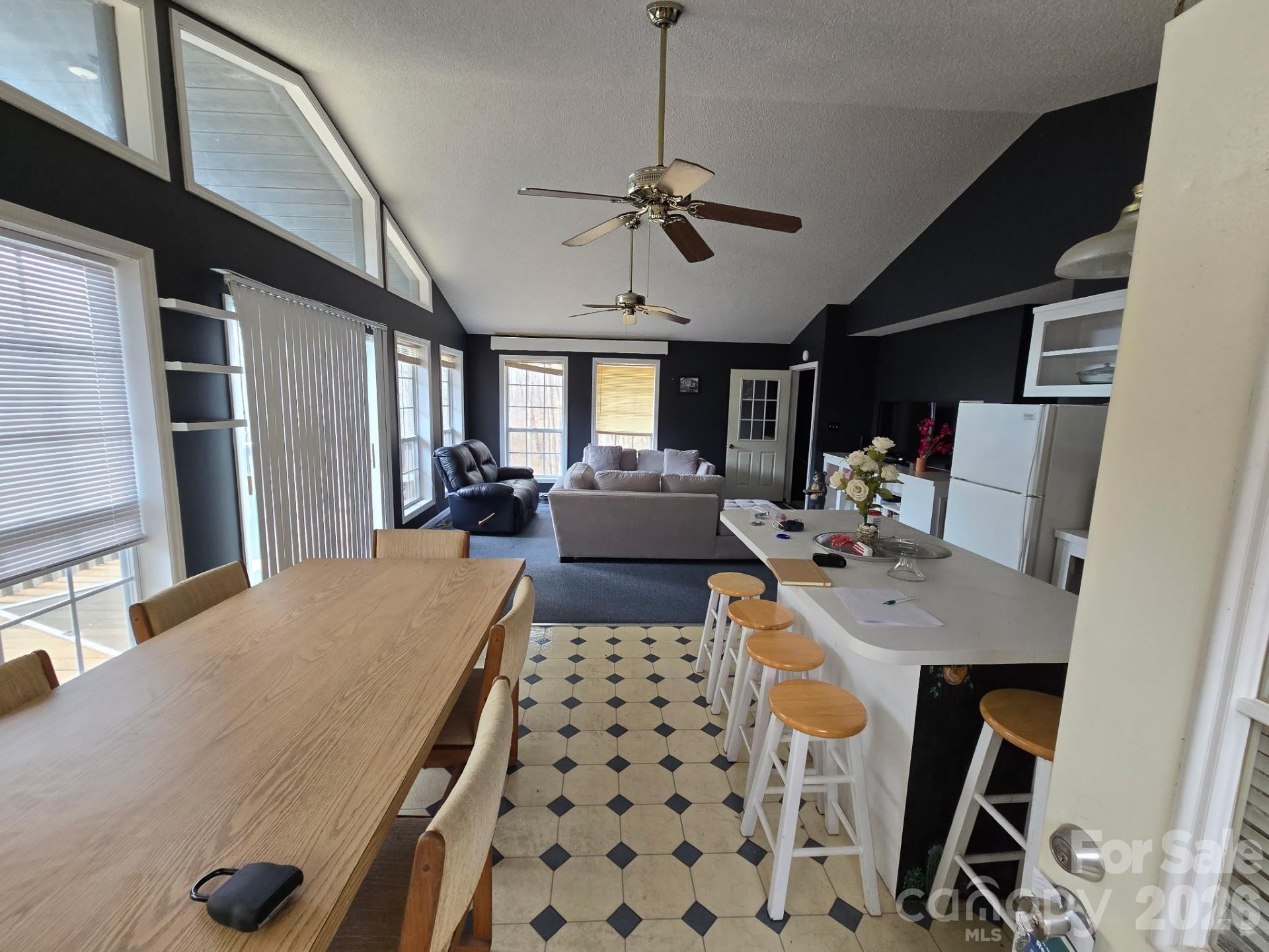 987 W Road Hot Springs, NC 28743 - Photo 5 of 10 a dining room with furniture and wooden floor
