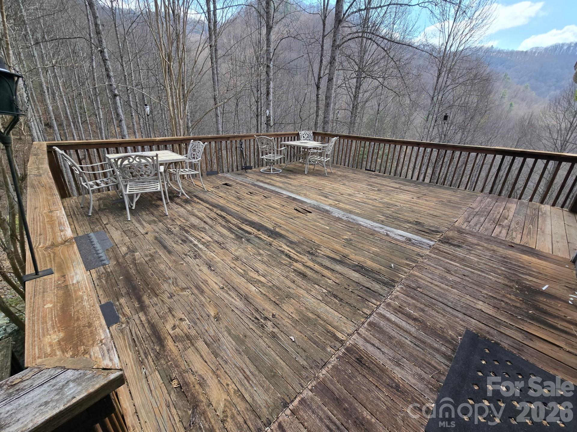 987 W Road Hot Springs, NC 28743 - Photo 9 of 10 a view of backyard with a table and chairs