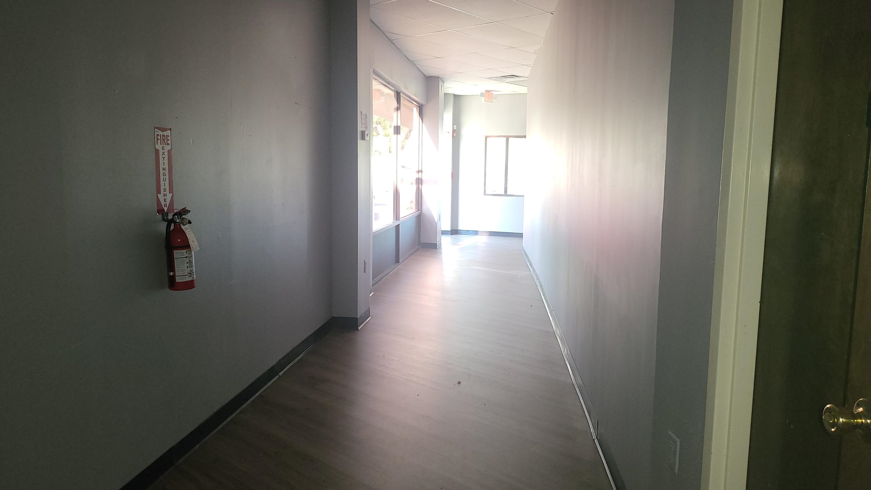 6001 Bartlett Center Drive Bartlett, TN 38134 - Photo 14 of 15 a view of a hallway with wooden floor