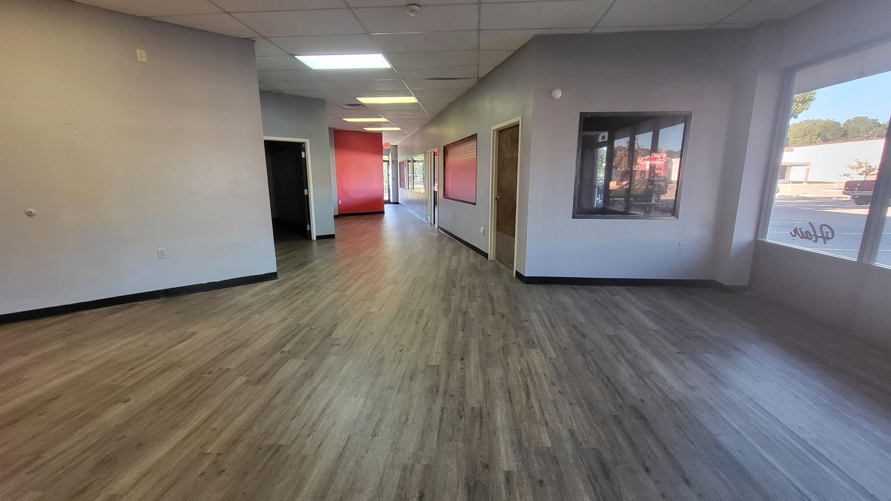 6001 Bartlett Center Drive Bartlett, TN 38134 - Photo 8 of 15 a view of a room with wooden floor and windows