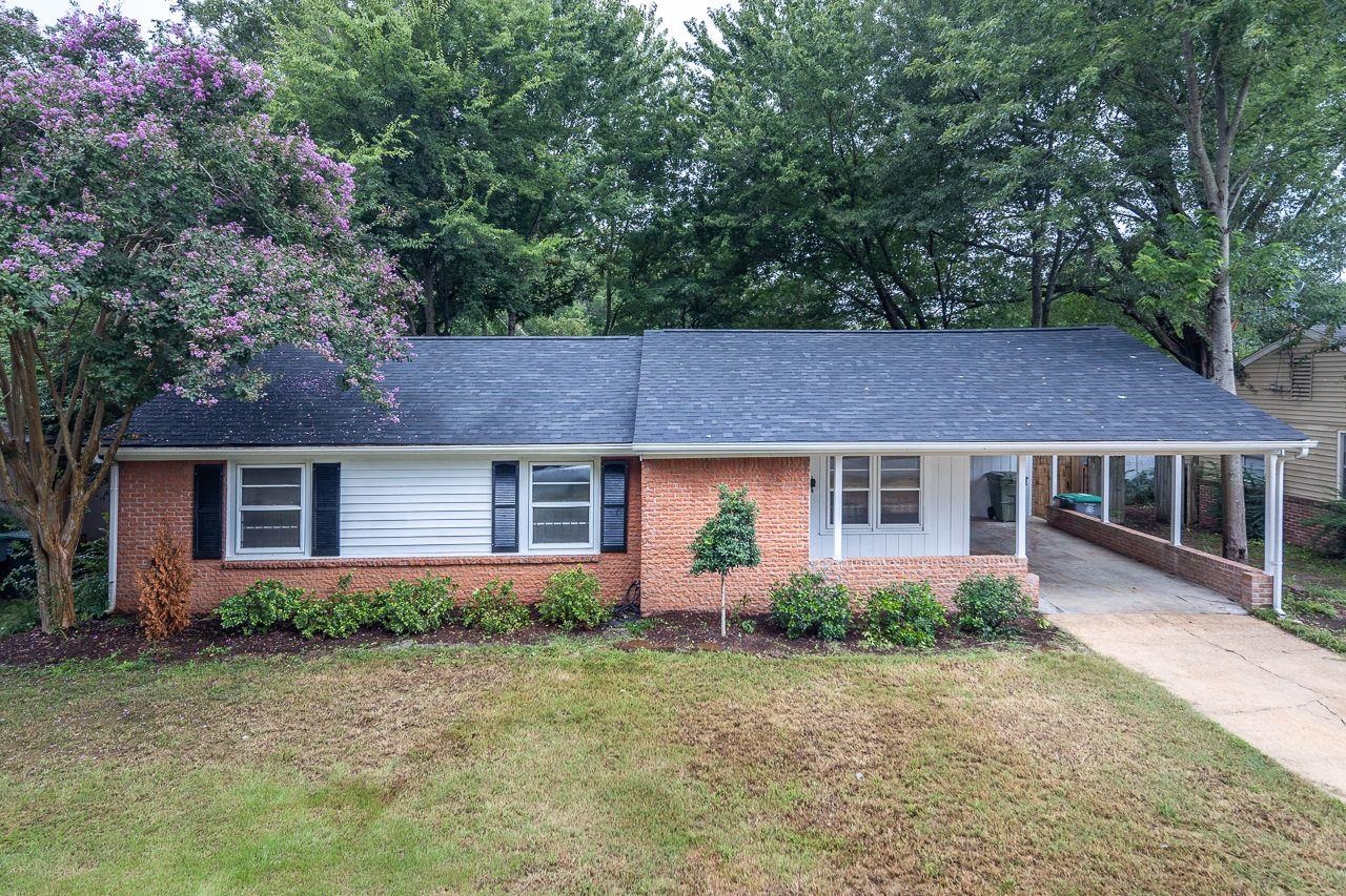 1243 Dearing Road Memphis, TN 38117 - Photo 1 of 25 front view of house with a yard