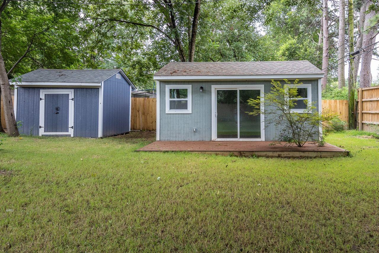 1243 Dearing Road Memphis, TN 38117 - Photo 24 of 25 a view of a house with backyard garden and sitting area