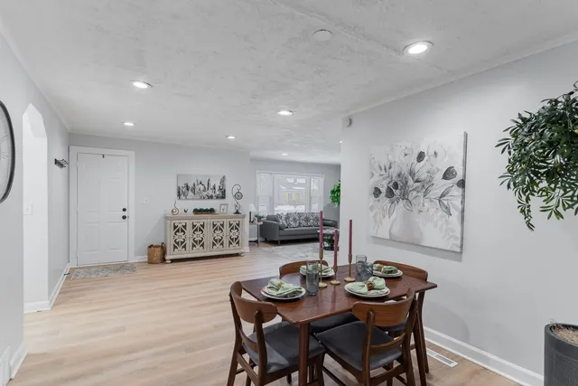 a view of work space with furniture and window