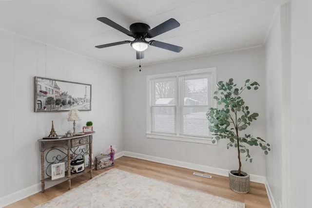 a view of a livingroom with natural light